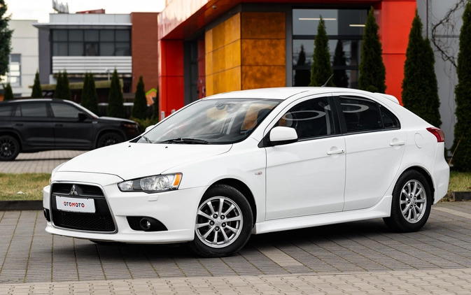 Mitsubishi Lancer cena 32900 przebieg: 150000, rok produkcji 2014 z Radom małe 596